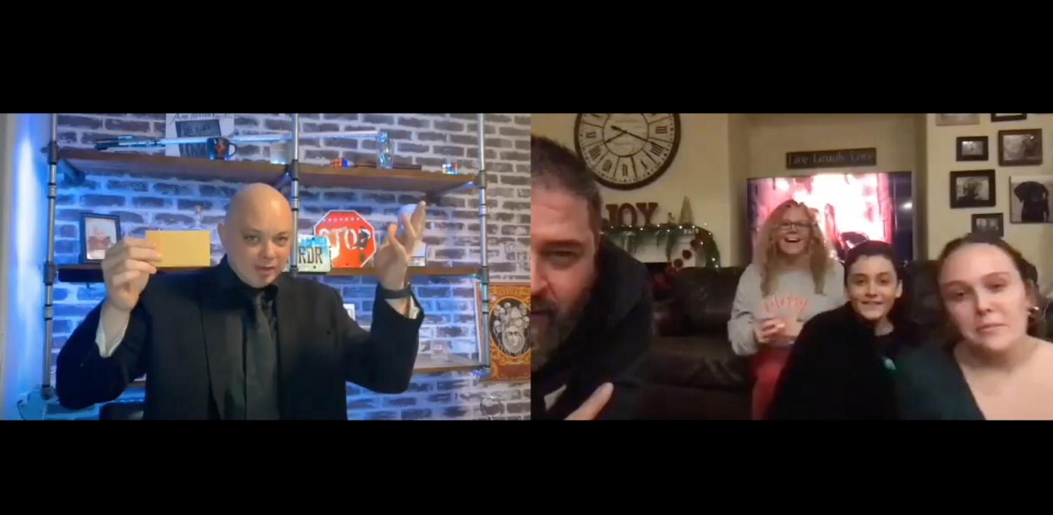 Magician performing magic over Zoom to a stunned audience