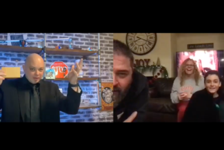 Magician performing magic over Zoom to a stunned audience