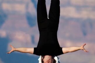 Upside down straight jacket escape from a helicopter