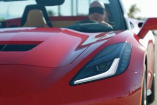 Blindfolded mentalist driving a car